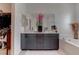 Elegant bathroom with double sinks and a soaking tub at 4138 Bayley Skye Ave, Las Vegas, NV 89141