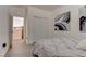 Comfortable bedroom with a queen bed and access to loft at 4138 Bayley Skye Ave, Las Vegas, NV 89141