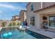 Luxury pool area with hammock and patio furniture at 4138 Bayley Skye Ave, Las Vegas, NV 89141