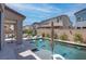 Inviting backyard oasis featuring a sparkling pool and patio furniture at 4138 Bayley Skye Ave, Las Vegas, NV 89141