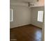 Simple bedroom with tile floor and ceiling fan at 431 Bedford Rd, Las Vegas, NV 89107