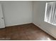 Spacious bedroom with tile floors and a window at 431 Bedford Rd, Las Vegas, NV 89107