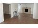 Open living area with tile floors and a fireplace at 431 Bedford Rd, Las Vegas, NV 89107