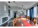 Bright dining room features a spacious table with seating for eight and hardwood floors at 4421 Rodman Dr, Las Vegas, NV 89130