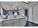 Kitchen with a white tile counter, stainless steel appliances, and white cabinets at 4421 Rodman Dr, Las Vegas, NV 89130