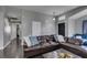 Living area showcasing a sectional sofa and a view down a hallway at 4421 Rodman Dr, Las Vegas, NV 89130