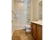 Bathroom with shower/tub combo and wood vanity at 4520 Lemon Gems Ct, Las Vegas, NV 89130