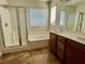 Bathroom boasts double sinks, soaking tub and shower at 4520 Lemon Gems Ct, Las Vegas, NV 89130