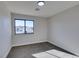 Simple bedroom with neutral walls and carpet at 4962 E Baltimore Ave, Las Vegas, NV 89104