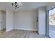 Dining area with hardwood floors and sliding door to backyard at 4962 E Baltimore Ave, Las Vegas, NV 89104