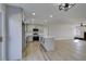 Modern kitchen with island, gray cabinets and stainless steel appliances at 4962 E Baltimore Ave, Las Vegas, NV 89104