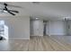 Open living room and hallway with laminate wood floors at 4962 E Baltimore Ave, Las Vegas, NV 89104