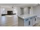 Bright living room with fireplace and hardwood flooring at 4962 E Baltimore Ave, Las Vegas, NV 89104