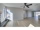 Living room with hardwood floors, fireplace and kitchen view at 4962 E Baltimore Ave, Las Vegas, NV 89104