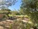 View of backyard, trees, and golf course from balcony at 5381 Waving Sage Dr, Las Vegas, NV 89149