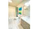 Updated bathroom with modern vanity and bathtub at 5381 Waving Sage Dr, Las Vegas, NV 89149