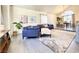 Open living room with hardwood floors, a neutral color palette, and ample natural light at 5381 Waving Sage Dr, Las Vegas, NV 89149