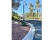 Quiet residential street lined with palm trees at 5381 Waving Sage Dr, Las Vegas, NV 89149