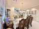 Formal dining room with ornate wooden table and chairs at 6454 Mount Palomar Ave, Las Vegas, NV 89139