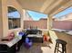 Covered patio with outdoor kitchen, seating and a grilling area at 6454 Mount Palomar Ave, Las Vegas, NV 89139