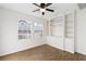 Bedroom with built-in shelving and wood-look floors at 659 I, Boulder City, NV 89005