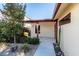 Home features a covered patio and walkway to the front door at 659 I, Boulder City, NV 89005