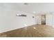 Bright and airy living room with wood-look tile floors at 659 I, Boulder City, NV 89005