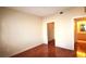 Bedroom with wood floors and access to bathroom and closet at 6955 N Durango Dr # 1085, Las Vegas, NV 89149