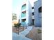 Building exterior with teal accents and stairs at 6955 N Durango Dr # 1085, Las Vegas, NV 89149