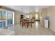 Kitchen and dining area with tile floors at 718 Glenwood Springs Ave, North Las Vegas, NV 89032