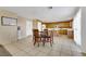 Kitchen with light wood cabinets and tile flooring at 718 Glenwood Springs Ave, North Las Vegas, NV 89032