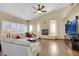 Spacious living room featuring a fireplace and hardwood floors at 718 Glenwood Springs Ave, North Las Vegas, NV 89032