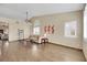 Living room with hardwood floors and a cozy seating area at 718 Glenwood Springs Ave, North Las Vegas, NV 89032