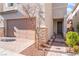 Brick pathway leads to the front door of the house at 7563 Chimney Point Ct, Las Vegas, NV 89166