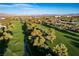 Aerial view of lush green golf course community at 796 Tam O Shanter, Las Vegas, NV 89109