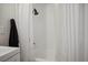 Simple bathroom with a shower/tub combo and white shower curtain at 796 Tam O Shanter, Las Vegas, NV 89109