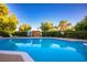 Inviting community pool with surrounding greenery at 796 Tam O Shanter, Las Vegas, NV 89109