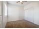 Comfortable bedroom with ceiling fan and sliding door closet at 833 Aspen Peak Loop # 2524, Henderson, NV 89011