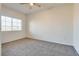 Bright bedroom with window, ceiling fan and carpet at 833 Aspen Peak Loop # 2524, Henderson, NV 89011