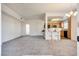 Open concept kitchen and dining area with breakfast bar and modern appliances at 833 Aspen Peak Loop # 2524, Henderson, NV 89011