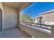 Private patio with view of neighboring building at 833 Aspen Peak Loop # 2524, Henderson, NV 89011