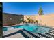 Enjoy this inviting kidney-shaped pool with a private feel at 8435 Great Outdoors St, Las Vegas, NV 89166