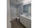 Clean bathroom with white vanity and bathtub at 8600 W Charleston Blvd # 1129, Las Vegas, NV 89117