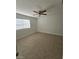 Bright bedroom with tile floors and ceiling fan at 8600 W Charleston Blvd # 1129, Las Vegas, NV 89117