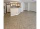 Kitchen with breakfast bar and tile floors at 8600 W Charleston Blvd # 1129, Las Vegas, NV 89117