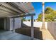 Landscaped backyard with pergola and gravel ground cover at 8712 Majestic Pine Ave, Las Vegas, NV 89143