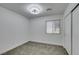 Spacious bedroom with neutral decor, new carpet and a window with blinds at 8712 Majestic Pine Ave, Las Vegas, NV 89143