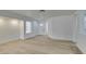 Spacious living room with light flooring and an open layout at 8712 Majestic Pine Ave, Las Vegas, NV 89143