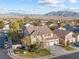 Two-story house with a three car garage and mountain views at 8728 Burning Hide Ave, Las Vegas, NV 89143