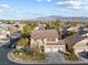 Two-story house with a three car garage and mountain views at 8728 Burning Hide Ave, Las Vegas, NV 89143